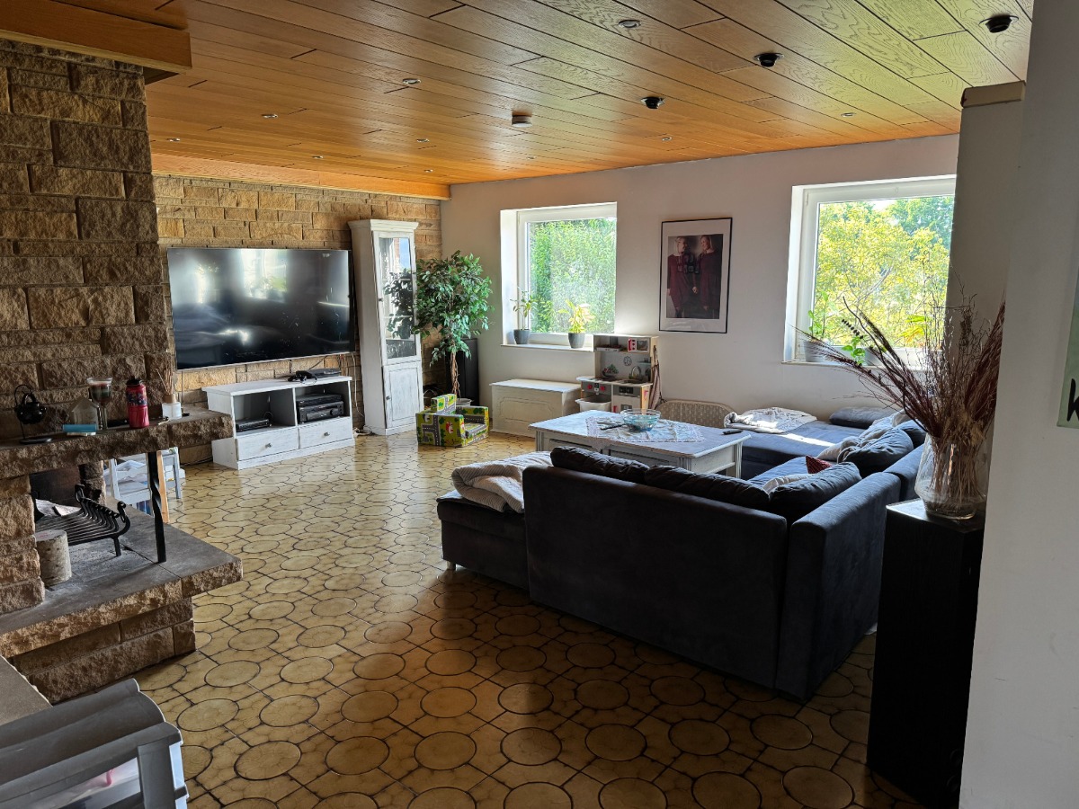 Wohnzimmer Obergeschoss Wohn- und Geschäftshaus